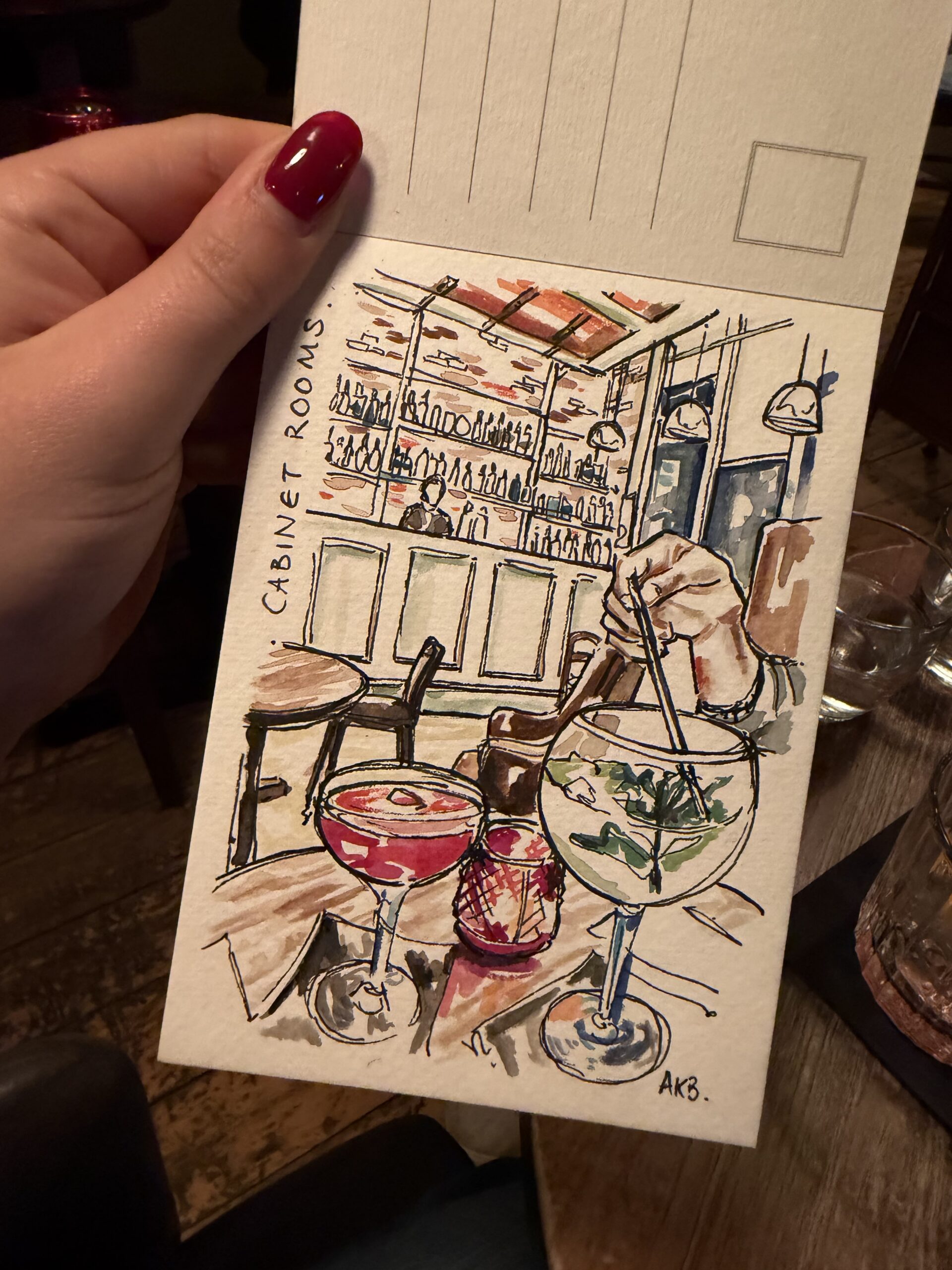 Watercolour and ink illustration of a chef cooking in a kitchen